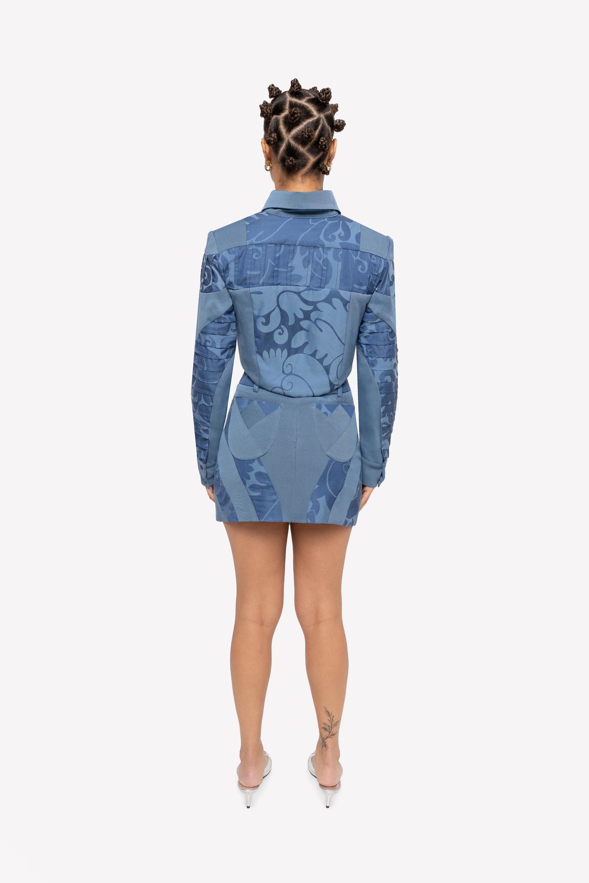 Look: Kim pintuck corset shirt and Dua high-waisted paneled skirt – worn, back view