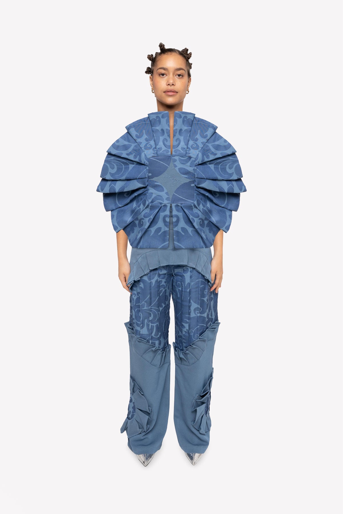 Look: Sevda sculptural corset and Gracie high-waisted paneled pants – worn, front view