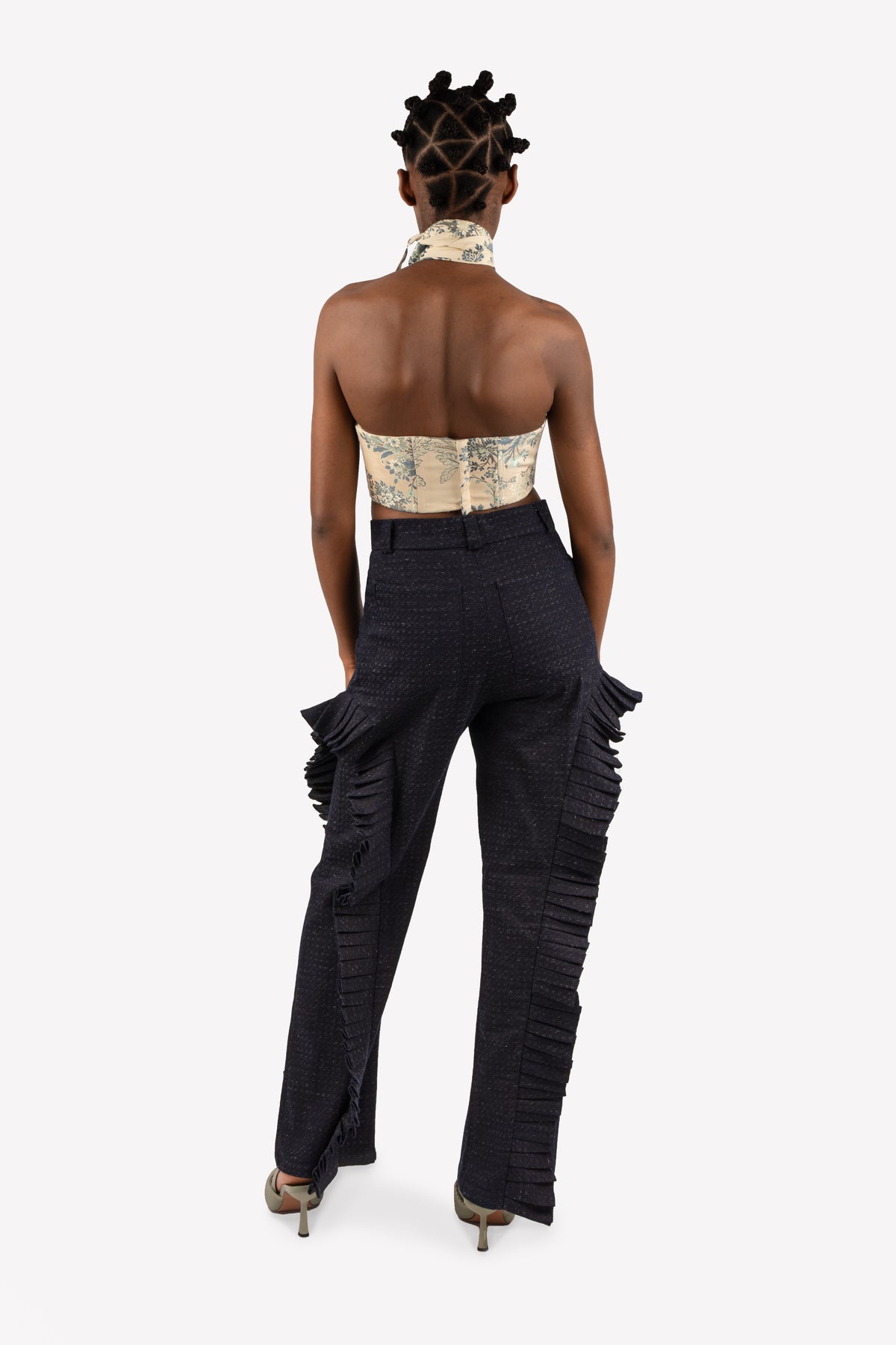Look: Grace upcycled curtain corset and Tove high-waisted pleated pants – worn, back view